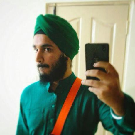 A Sikh Male rocking sick beard with a Punjabi Turban, and Orange Gaatra that holds a long Kirpan